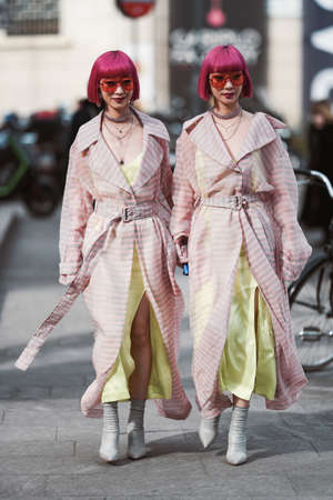 Milan, Italy - February 21, 2020: Ami SuzukiÂ and Aya Suzuki before a fashion show during Milan...