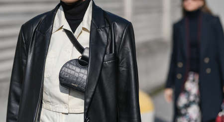 Milan, Italy - February 19, 2020: Street style detail - accesories and clothingstreet style clothing and accesory detail - StreetStyleFW2020のeditorial素材
