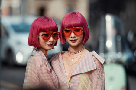 Milan, Italy - February 21, 2020: Ami SuzukiÂ and Aya Suzuki before a fashion show during Milan Fashion Week - streetstylefw20のeditorial素材
