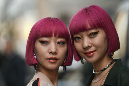 Milan, Italy - February 20, 2020: Ami Suzuki, Aya Suzuki before a fashion show during Milan Fashion Week - streetstylefw20のeditorial素材