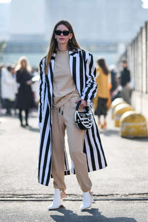 Milan, Italy - February 19, 2020: Street style appearance during Milan Fashion Week - streetstylefw20のeditorial素材