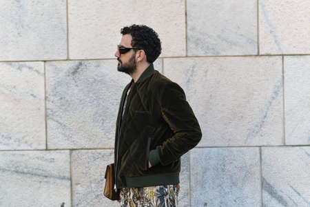 Milan, Italy - February 19, 2020: Street style appearance during Milan Fashion Week - streetstylefw20のeditorial素材