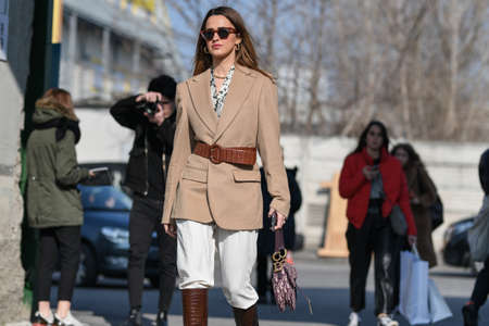 Milan, Italy - February 19, 2020: Street style appearance during Milan Fashion Week - streetstylefw20のeditorial素材
