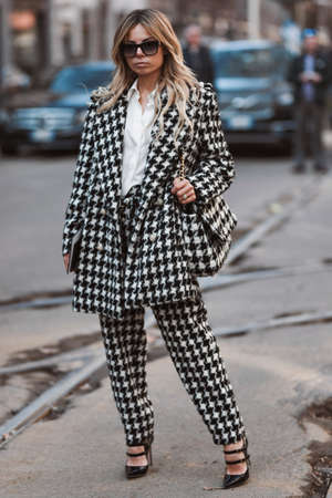 Milan, Italy - February 23, 2020: Street style appearance during Milan Fashion Week - streetstylefw20のeditorial素材