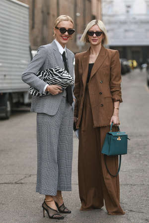Milan, Italy - February 20, 2020: Viktoria Rader, Lisa Hahnbuck before a fashion show during Milan Fashion Week - streetstylefw20のeditorial素材