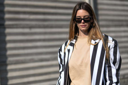 Milan, Italy - February 19, 2020: Street style appearance during Milan Fashion Week - streetstylefw20のeditorial素材