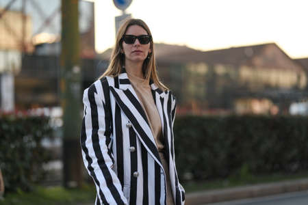 Milan, Italy - February 19, 2020: Street style appearance during Milan Fashion Week - streetstylefw20のeditorial素材