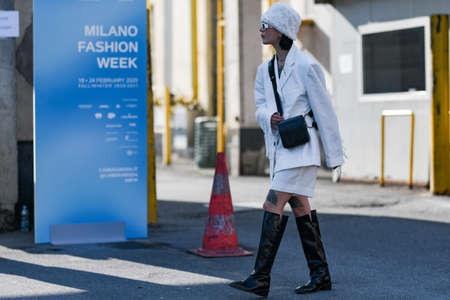 Milan, Italy - February 19, 2020: Street style appearance during Milan Fashion Week - streetstylefw20のeditorial素材