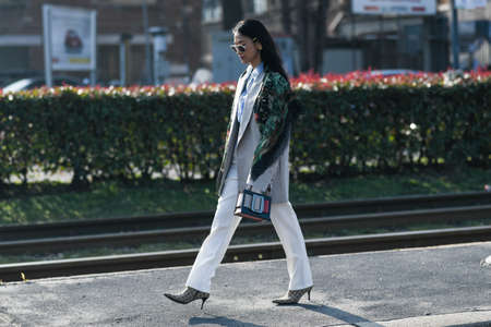 Milan, Italy - February 19, 2020: Street style appearance during Milan Fashion Week - streetstylefw20のeditorial素材