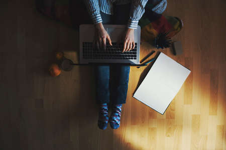 friendly workspace - girl working from homeの写真素材