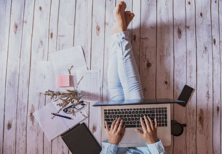 friendly workspace - girl working from homeの写真素材