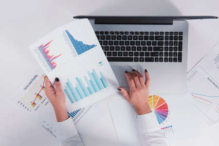 girl working with charts and graphsの写真素材