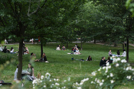 Bucharest, Romania - 16 May 2020: People in Cismigiu Park on the second day of relaxation of the measures taken by the authorities against the COVID-19 pandemic, in Bucharest.のeditorial素材
