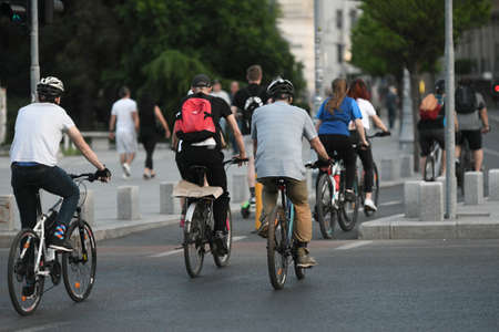 Bucharest, Romania - 16 May 2020: Cyclists on Calea Victoriei on the second day of alert caused by the COVID-19 pandemicのeditorial素材