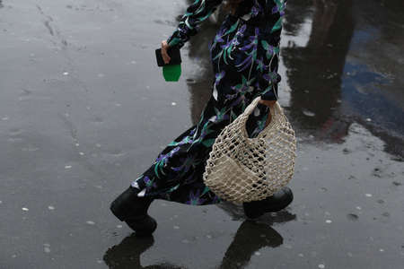 Paris, France  March 2, 2020: Beige woven handbag - streetstylefw20のeditorial素材
