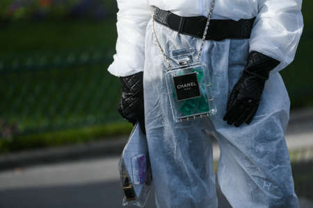 Paris, France â March 3, 2020: Chanel perfume bottle chain bag - streetstylefw20のeditorial素材