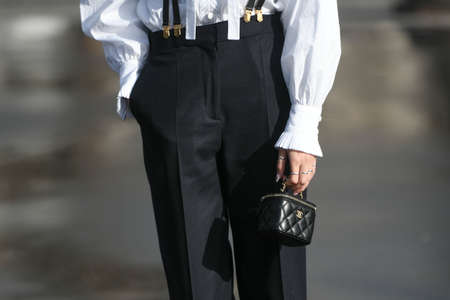Paris, France â March 3, 2020: Black leather Chanel mini handbag - streetstylefw20のeditorial素材
