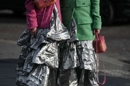 Paris, France â March 3, 2020: Women wearing silver ruffled maxi dresses - streetstylefw20のeditorial素材