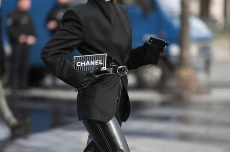 Paris, France â March 3, 2020: Black metallic Chanel clutch bag - streetstylefw20のeditorial素材