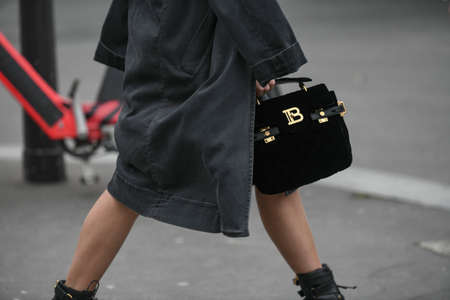 Paris, France - February 28, 2020: Black Balmain handbag detail - streetstylefw20のeditorial素材