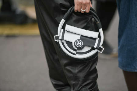 Paris, France - February 28, 2020: Black and white Balmain leather circle bag - streetstylefw20のeditorial素材