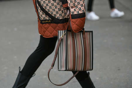 Paris, France - February 29, 2020: Burberry stripped handbag - streetstylefw20のeditorial素材