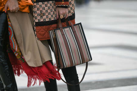 Paris, France - February 29, 2020: Burberry striped handbag detail - streetstylefw20のeditorial素材
