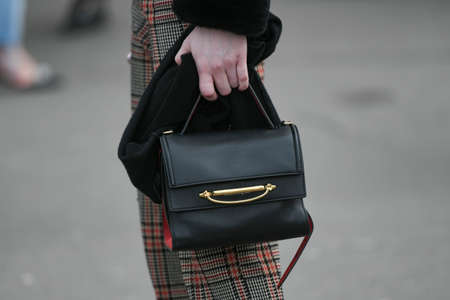 Paris, France - February 29, 2020: Black leather Alexander Mcqueen handbag - streetstylefw20のeditorial素材