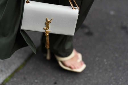 Paris, France - February 29, 2020: White leather Yves Saint Laurent chain bag detail - streetstylefw20のeditorial素材