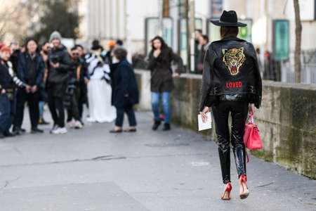 Paris, France - February 29, 2020: Woman wearing a black leather outfit - streetstylefw20のeditorial素材