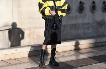 Paris, France - February 26, 2020: Black Yves Saint Laurent triangle handbag - streetstylefw20のeditorial素材
