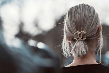 Paris, France â March 3, 2020: Women wearing a Chanel hair accesory - streetstylefw20のeditorial素材