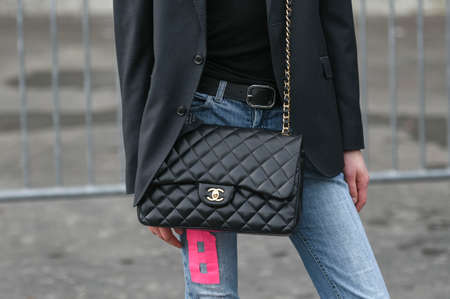 Paris, France â March 3, 2020: Black leather patterned Chanel crossbody bag - streetstylefw20のeditorial素材