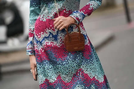 Paris, France - February 27, 2020: Detail of a Lancel crossbody bag - streetstylefw20のeditorial素材