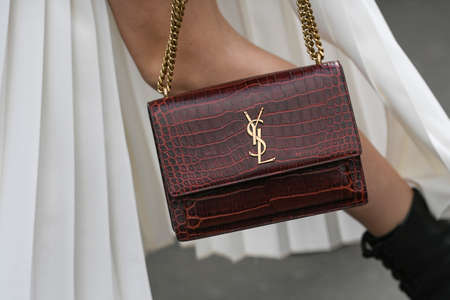 Paris, France - February 27, 2020: Detail of a Yves Saint Laurent leather purse - streetstylefw20のeditorial素材