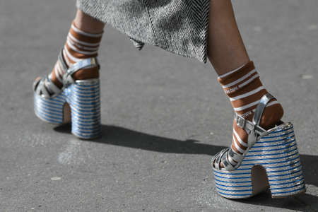 Paris, France â March 3, 2020: Silver Miu Miu high heel sandals matched with Miu Miu striped socks - streetstylefw20のeditorial素材