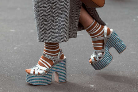 Paris, France â March 3, 2020: Silver Miu Miu high heel sandals matched with Miu Miu striped socks - streetstylefw20のeditorial素材