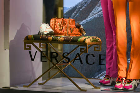 Milan, Italy - January 13, 2020: Versace handbags, sneakers and sunglasses displayのeditorial素材