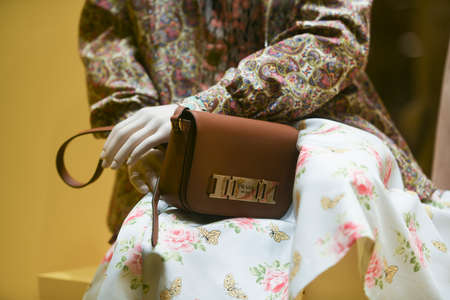 Milan, Italy - January 13, 2020: Prada brown leather purse on a mannequin detailのeditorial素材