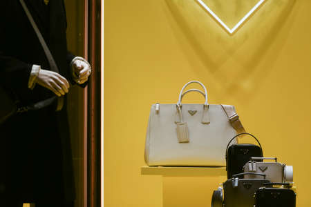 Milan, Italy - January 13, 2020: Prada leather handbags display