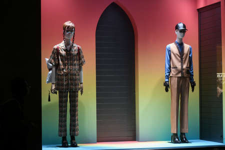 Milan, Italy - January 13, 2020: Gucci outfits in a rainbow colored showcaseのeditorial素材