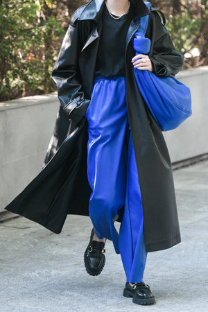 Milan, Italy - September 24, 2021:  Street style outfit, woman wearing a leather outfit on the streets of Milan, Italy.のeditorial素材