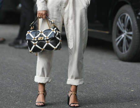 Milan, Italy - September 23, 2021:  Street style outfit, woman wearing a fashionable outfit, detail,...