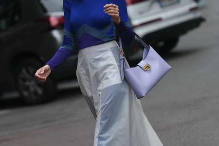 Milan, Italy - September 25, 2021:  Street style outfit, woman wearing a fashionable outfit on the streets of Milan, Italy.のeditorial素材