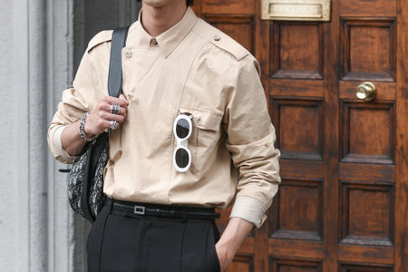 Milan, Italy - September 25, 2021:  Street style outfit, man wearing a fashionable outfit, detail  on the streets of Milan, Italy.のeditorial素材
