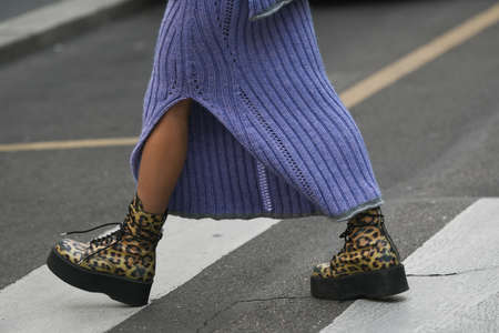 Milan, Italy - September 22, 2021:  Street style outfit, woman wearing a fashionable outfit, shoes detail,  on the streets of Milan, Italy.のeditorial素材