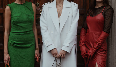 Milan, Italy - September 25, 2021:  Street style outfit, group of three fashionable women on the streets of Milan, Italy.のeditorial素材