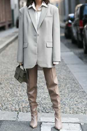 Milan, Italy - September 22, 2021:  Street style outfit, woman wearing a fashionable outfit,  on the streets of Milan, Italy.のeditorial素材