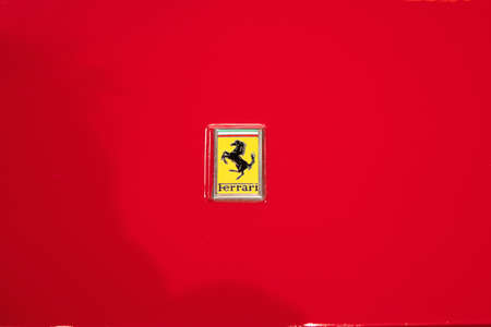Bucharest, Romania - January 11, 2019: Ferrari logo on a red Ferrari sport car in Tiriac Collection Museum.のeditorial素材