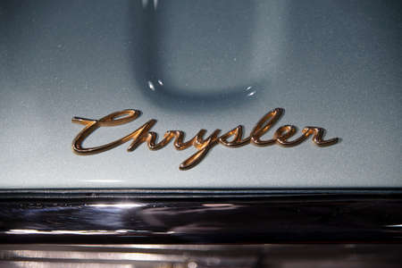 Bucharest, Romania - January 11, 2019: Crysler logo on a Chrysler New Yorker Convertible car from 1960, in Tiriac Collection Museum.のeditorial素材
